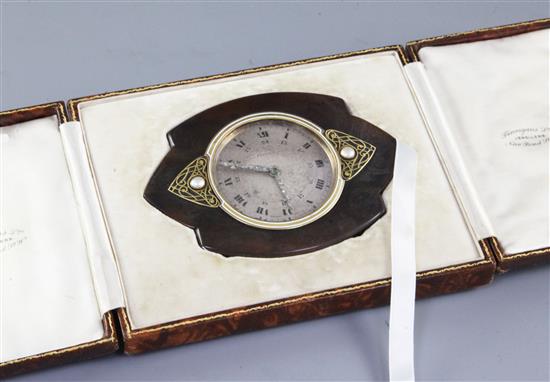 An early 20th century Art Nouveau white enamel inlaid tortoiseshell strutt clock, 11.2cm.